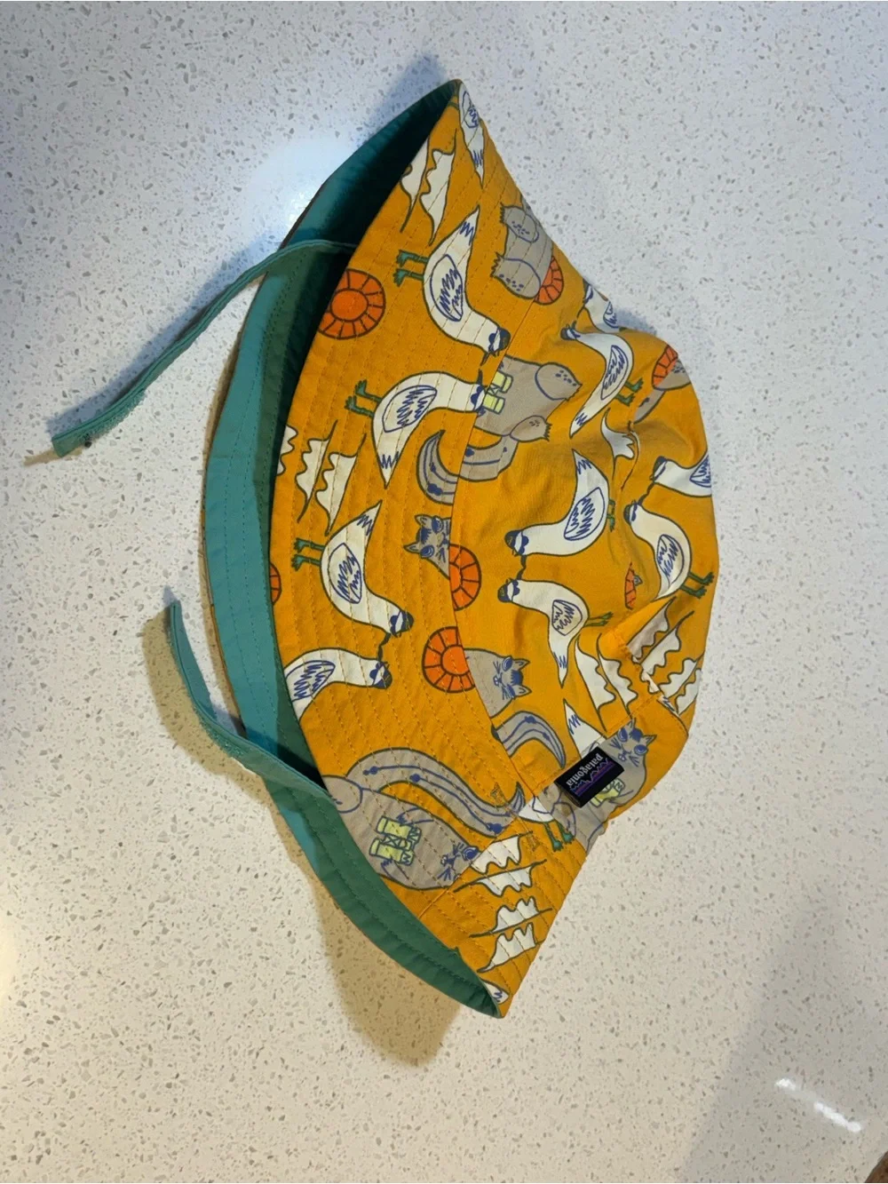 Patagonia Reversible Kids Sun Bucket Hat in Yellow with Teal Lining